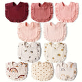 Baby Bibs in a Ten-Piece Mix of Solid Colors and Playful Prints with Ruffled Edges and Snap Closures