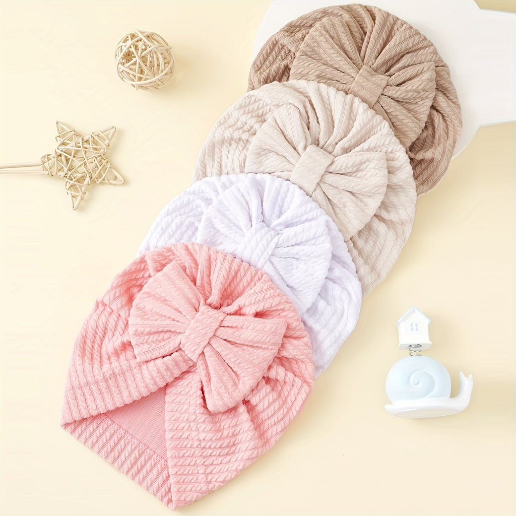Baby Girl Bow Turban Hats Four Pack in Ribbed Neutral and Pink Colors for Coordinated Everyday Outfits