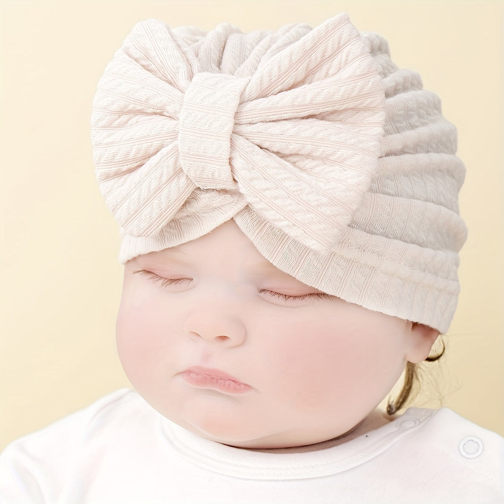 Baby Girl Bow Turban Hats Four Pack in Ribbed Neutral and Pink Colors for Coordinated Everyday Outfits