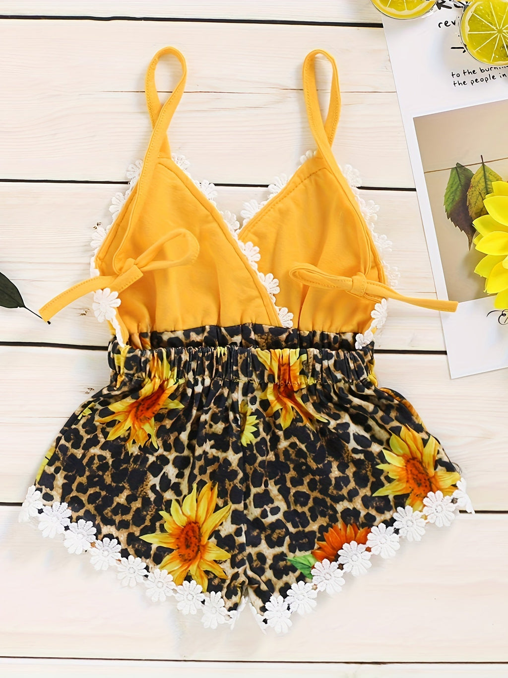 Baby Girl Sunflower and Leopard Print Romper with a Yellow Strappy Bodice and White Flower Trim