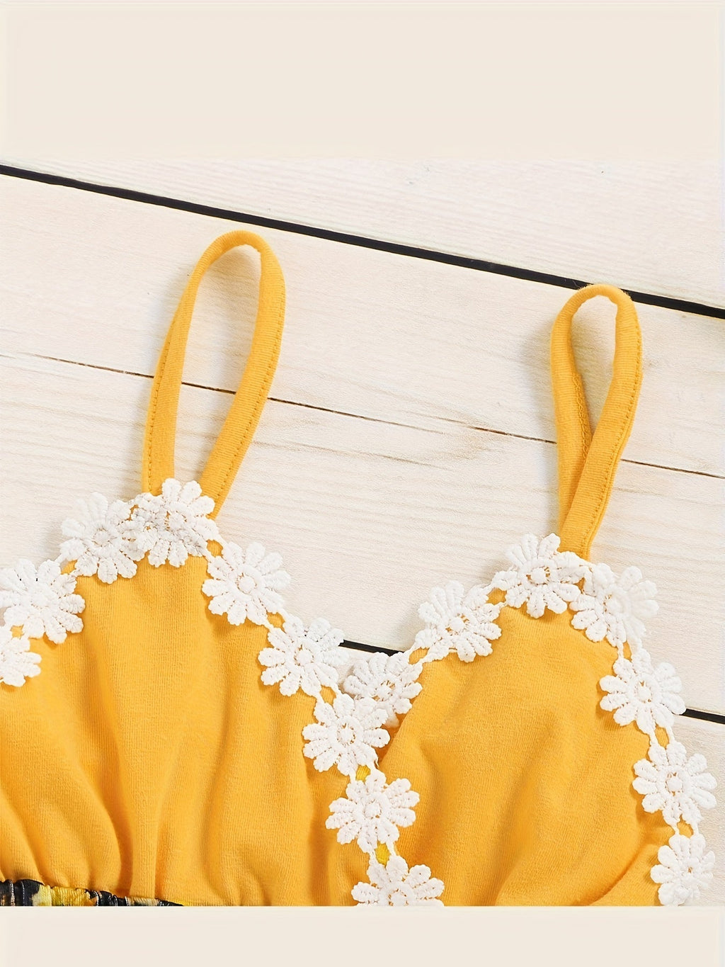 Baby Girl Sunflower and Leopard Print Romper with a Yellow Strappy Bodice and White Flower Trim