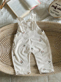 Baby Girls' Ivory Floral Overalls with an Embroidered Bib Pocket and Buttoned Straps for Layered Outfits