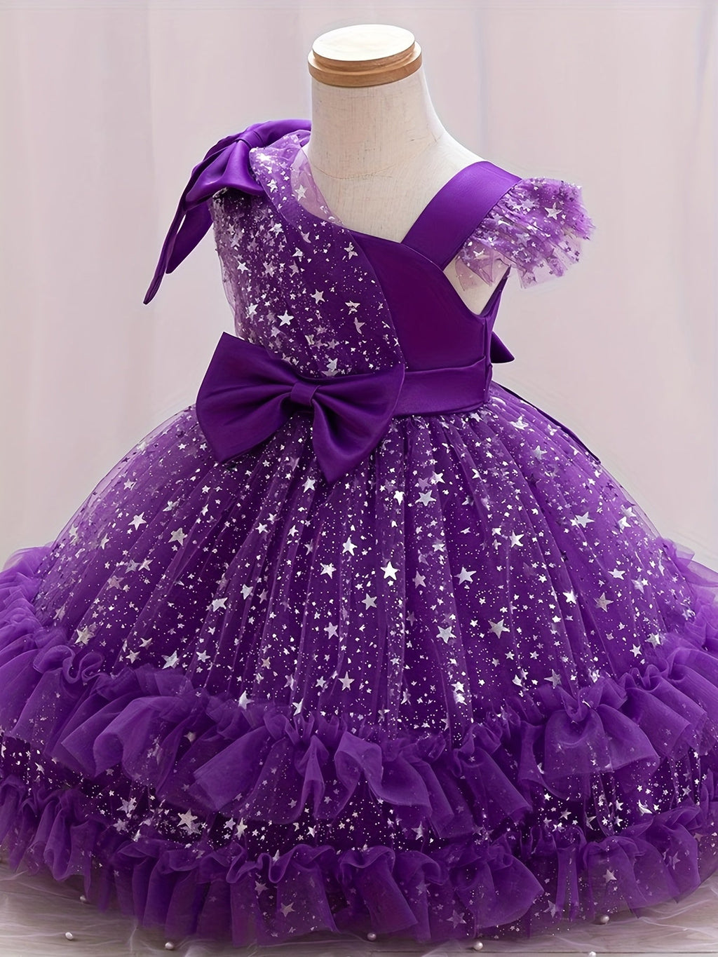 Girls' Star Tulle Party Dress with Large Bow Details and a Tiered Skirt for Birthdays and Celebrations