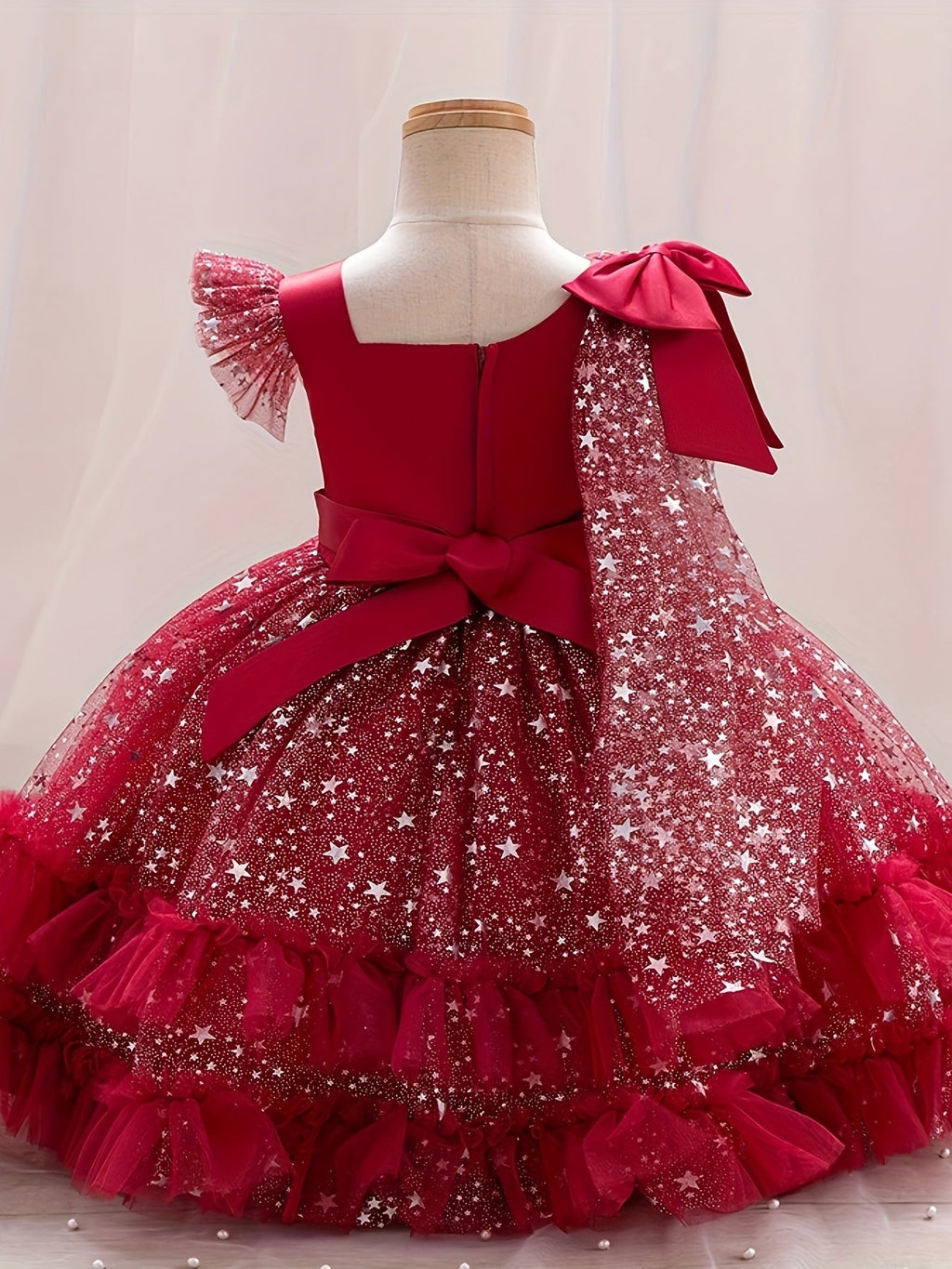 Girls' Star Tulle Party Dress with Large Bow Details and a Tiered Skirt for Birthdays and Celebrations