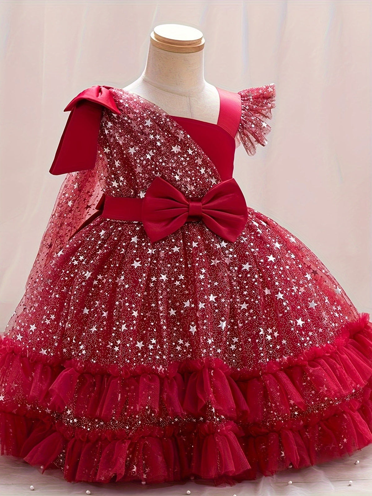 Girls' Star Tulle Party Dress with Large Bow Details and a Tiered Skirt for Birthdays and Celebrations