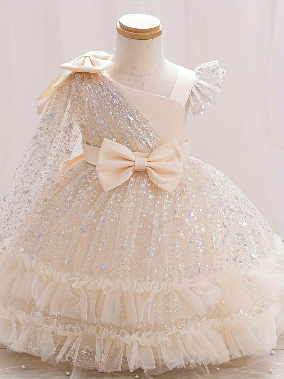 Girls' Star Tulle Party Dress with Large Bow Details and a Tiered Skirt for Birthdays and Celebrations