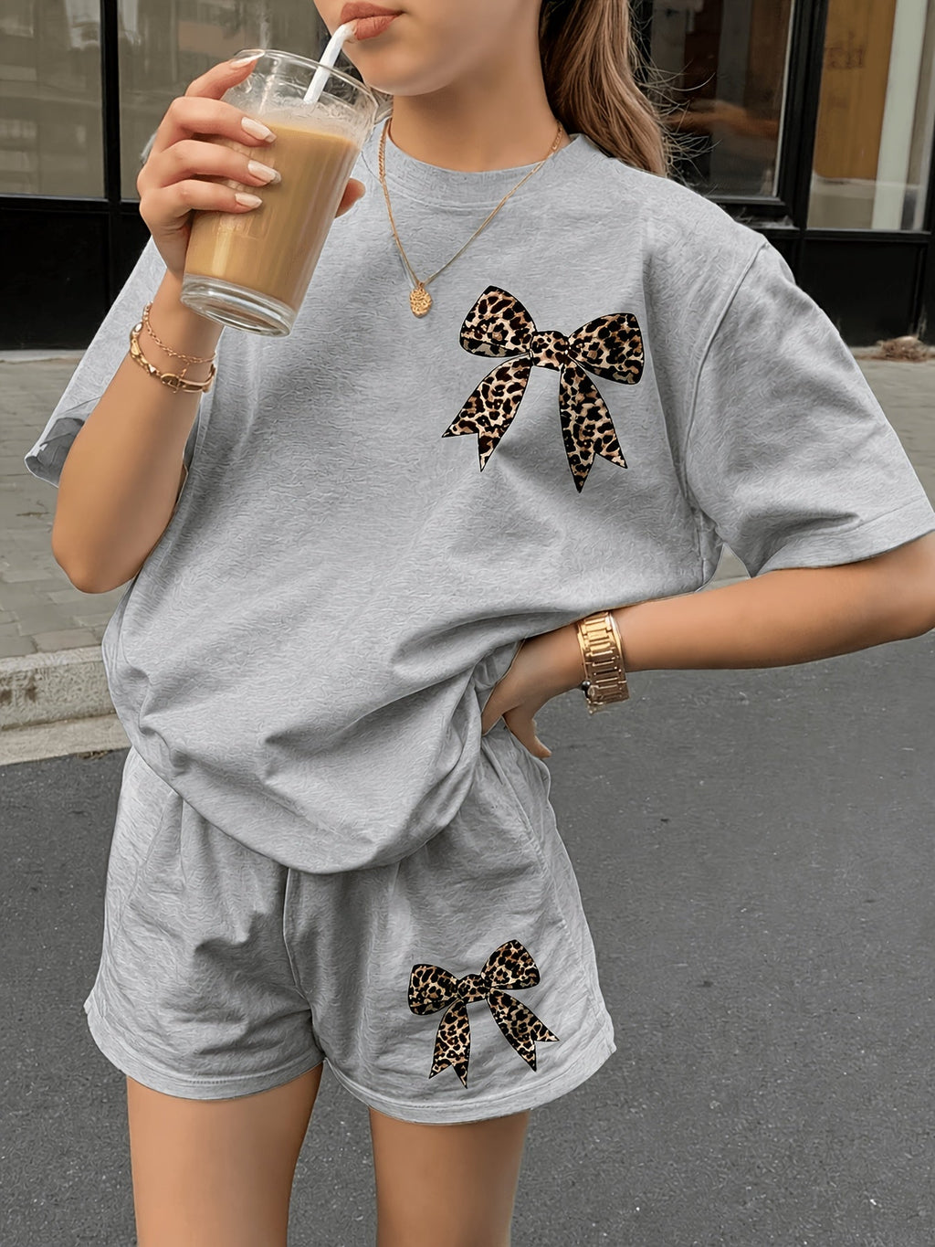 Girls' Apricot Two Piece Shorts Set with Leopard Bow Graphics and a Short Sleeve Crew Neck Top