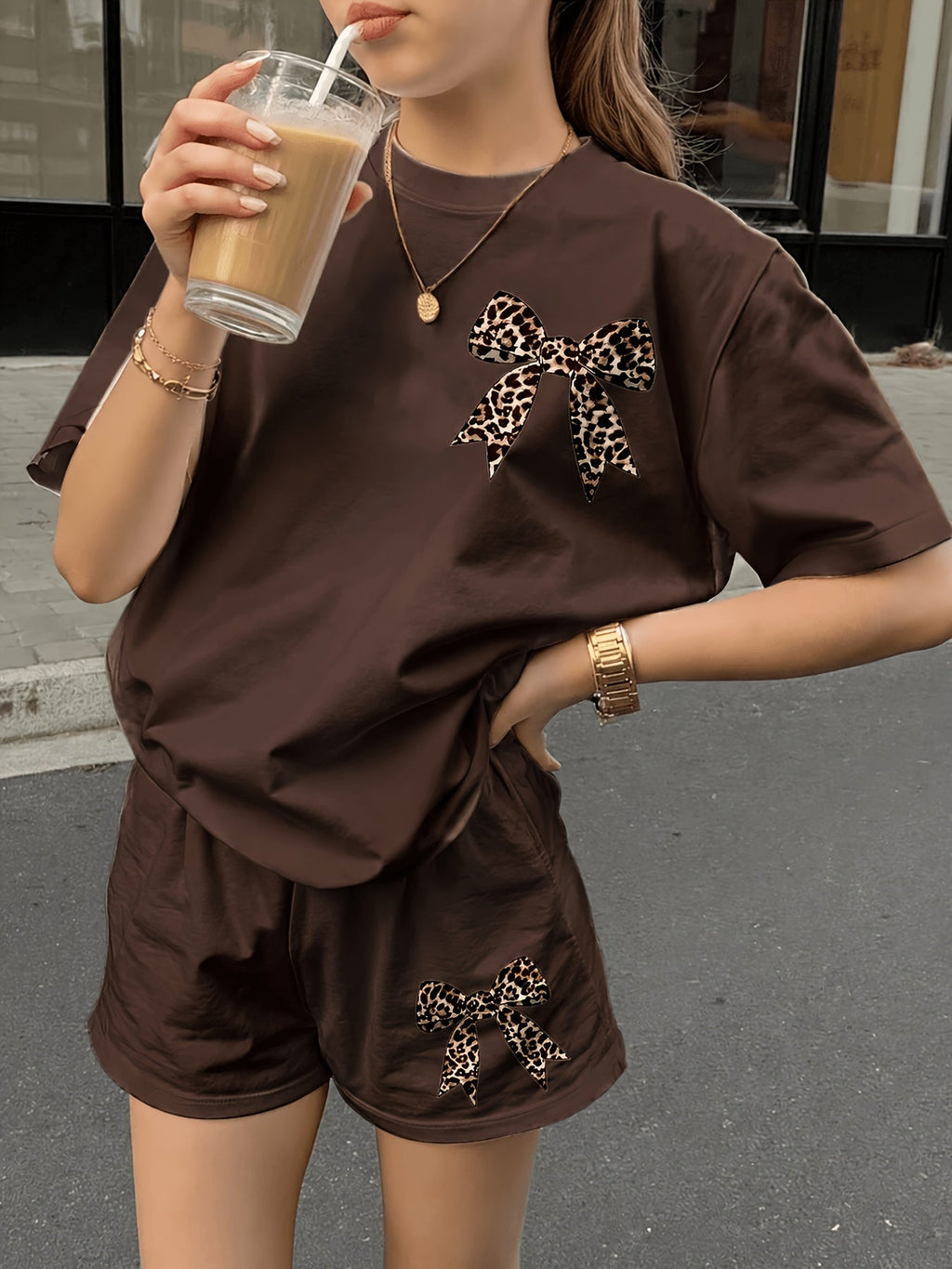 Girls' Apricot Two Piece Shorts Set with Leopard Bow Graphics and a Short Sleeve Crew Neck Top