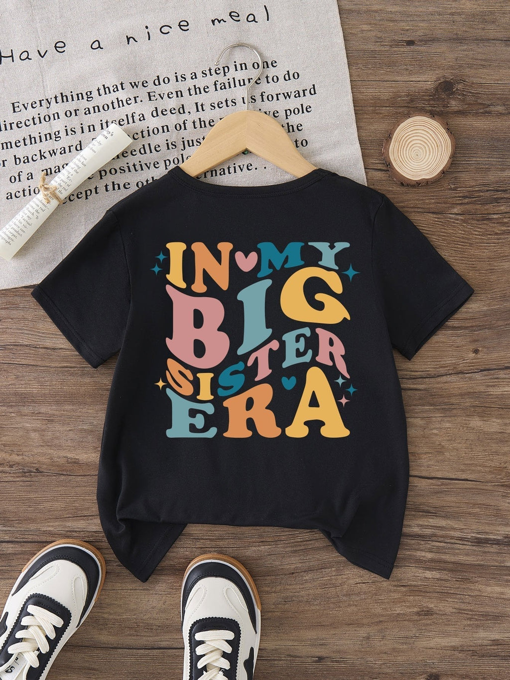 Girls' In My Big Sister Era T-Shirt in Black with a Butterfly Chest Print and Colorful Back Lettering