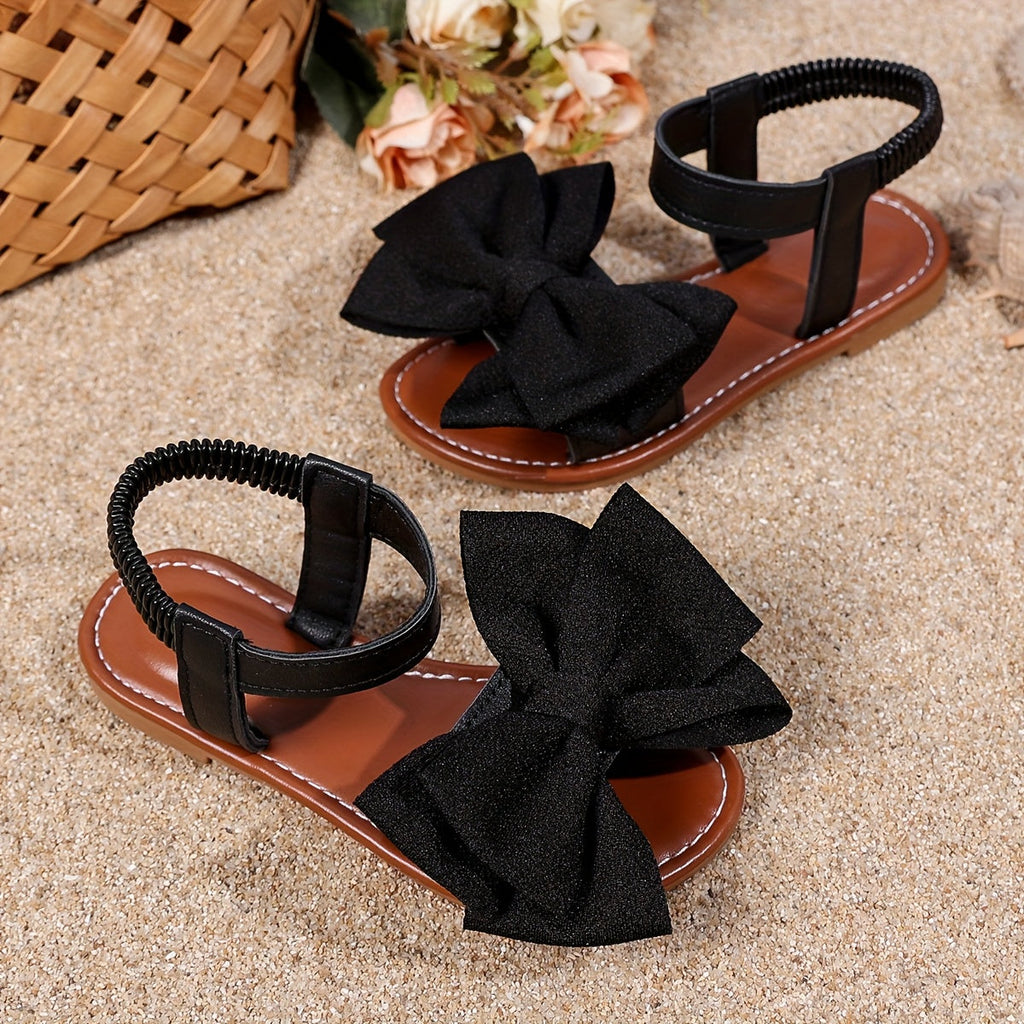 Girls' Flat Bow Sandals with Elastic Back Strap in Black or White for Summer Dresses and Casual Outfits