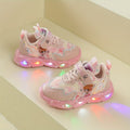 Girls' Light-Up Sneakers with Cartoon Wing Details and Colorful LED Soles in Pink or Purple for Playful Outfits