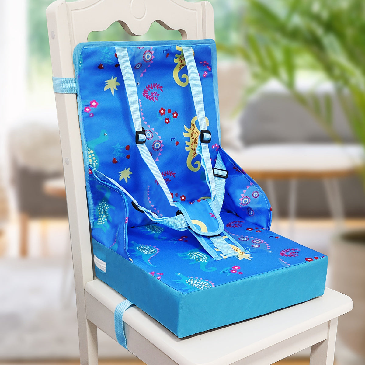 Dining Booster Seat Cushion with an Attached Back Pad and Adjustable Straps in Playful Printed Designs